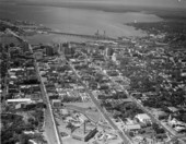 Aerial view showing a section of downtown with the Saint Johns River in the background - Jacksonville, Florida.