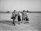 Unidentified National Guard pilot walking with women - Jacksonville, Florida.