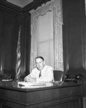 Governor Charley Johns in his office.