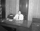 Governor Charley Johns in his office.