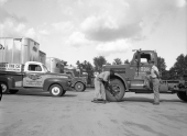 Replacing a tire for M.R. and R. trucking.