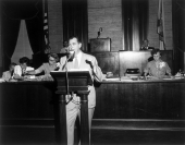 Man speaking in the legislative session