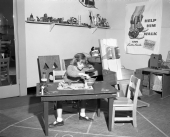 Girl playing in the toy room in the Easter Seal Therapy Center.