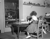 Girl playing in the toy room in the Easter Seal Therapy Center.