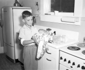 Ryan Edwards drying dishes.