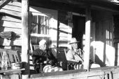 Couple on their porch.