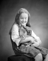 Portrait of Monica Herz with a cat - Tallahassee, Florida.