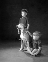 Portrait of Bart and Drew Mitchell with a dog - Tallahassee, Florida.