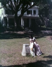 People viewing sundial in front of the main house at Goodwood Plantation in Tallahassee, Florida.