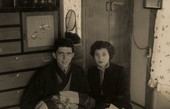Florida photographer Richard Parks with a woman in Korea during the war.