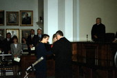 Scene showing newly sworn-in Justice Harry Lee Anstead (center) getting help from his daughters during the enrobing ceremony in Tallahassee, Florida