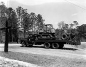 Truck sits with machinery on it - Newport, Florida