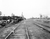 Looking north at Hannon Lumber Company with Woodville Highway and El Camino Motel in the distance