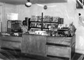 Sundries stand operated by an unidentified attendant