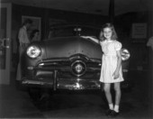 Shellie Frances Slade poses with a car - Tallahassee, Florida