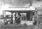 The boiling of cane syrup