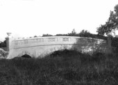 New bridge on west line of Charles Deering's reservation