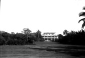 Lawn and house facing bay