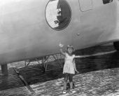 Paul Schwartz's daughter and an Eastern Air Lines plane.