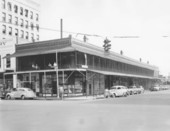 Jacksonville Street Scene with an storefronts on the corner of Bay and Ocean.
