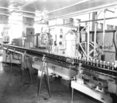Filled bottles at the Coca Cola Bottling plant.