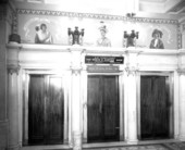 Paintings above the elevators in the Hotel Seminole.