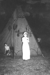 Boy scout dressed as baby?.