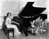 Miss Morrow at the piano.