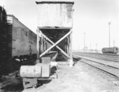 Train cars at ice company.