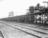Train cars at ice company.