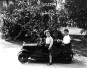 Boys and toy car.