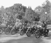 Policemen on motorcycles.