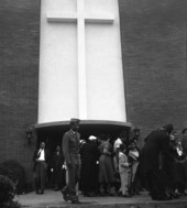 Guests outside the Blessed Sacrament Catholic Church following an African American wedding ceremony in Tallahassee, Florida.
