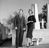 Unidentified couple visiting the Murat tombs in the Saint John's Episcopal Church Cemetery in Tallahassee, Florida.