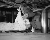 Women taking a course in car care, maintenance and operation in Tallahassee, Florida.