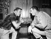 Pair of FSU Seminoles listening to Miami football game on the radio.