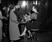 Ellinor couple being admitted to the National Guard dance on New Year's Eve in Tallahassee.