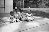 Girls playing jacks in Tallahassee.