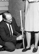 Rickards High School principal checking skirt length in Tallahassee.