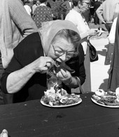 Elinor Brough enjoying oysters during the third annual Seafood Festival in Apalachicola.