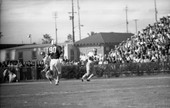 FSU wide receiver #25 Fred Biletnikoff with the football during game against the University of Oklahoma at the Gator Bowl in Jacksonville.