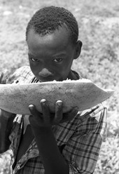 African American boy eating watermelon in Jefferson County.