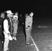 FSU head coach Bill Peterson on sideline with players during game in Tallahassee against the University of Houston.