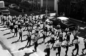 Marching band in the FAMU homecoming parade heading west on Call St. in Tallahassee.