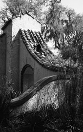 Holes in the entrance gate to Los Robles Park in Tallahassee.