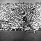 FSU player running with the football during game against UF in Tallahassee.