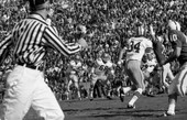 FSU quarterback Kim Hammond throwing to #34 flanker Ron Sellers during Gator Bowl game against PSU in Jacksonville.