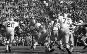 FSU QB #11 Kim Hammond handing off to #20 HB Larry Green during Gator Bowl game against PSU in Jacksonville.