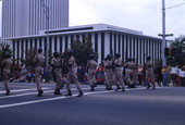 Soldiers marching in a parade on Monroe St. in front of the Florida State Capitol - Tallahassee, Florida.