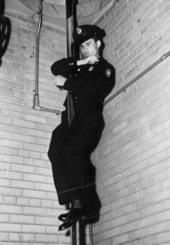 David Walker "DW" Harris sliding down pole at the Tallahassee Fire Department station.